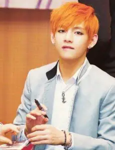 The orange hair of V with side bangs