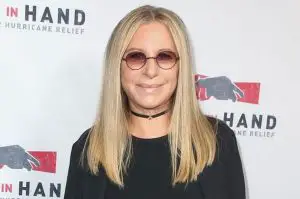 over 50 woman medium hair wearing glasses