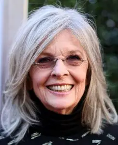 Actress Diane Keaton paired her medium hair with gray highlights with rimless glasses