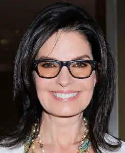 Medium length hair in black with glasses of the same color