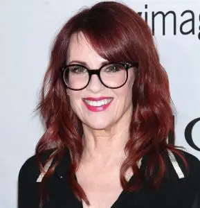 Medium length hairstyles for women over 50 with glasses
